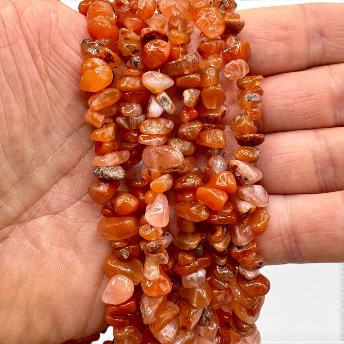 Fil de perles naturelles de Cornaline chips / Baroque 80cm