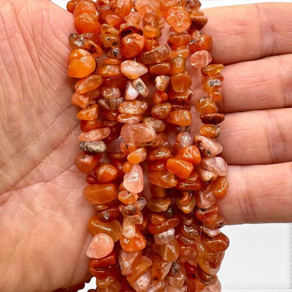 Fil de perles naturelles de Cornaline chips / Baroque 80cm